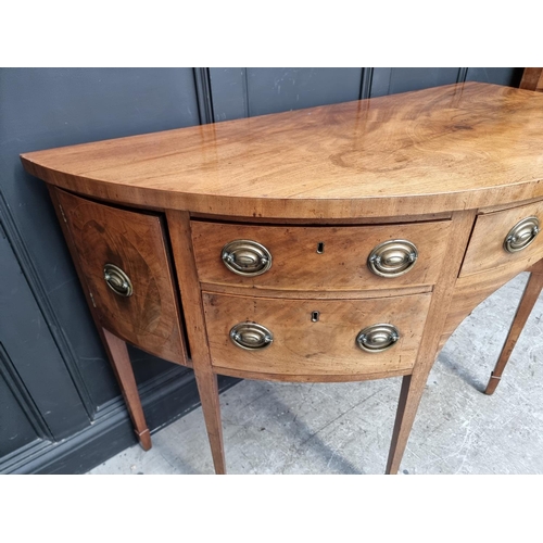 1046 - A George III mahogany and line inlaid demi-lune sideboard, 161cm wide.