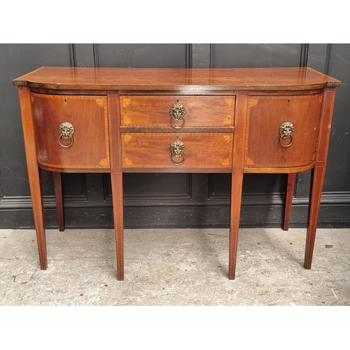 1047 - A late Victorian mahogany and line inlaid bowfront sideboard, 137cm wide.