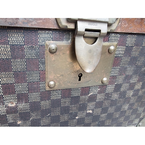 1048 - A late 19th/early 20th century Moynat 'Damier' trunk, labelled to the interior, 34cm high x 110.5cm ... 