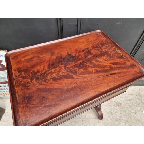 1052 - A 19th century continental mahogany work table, with hinged top, 55cm wide.