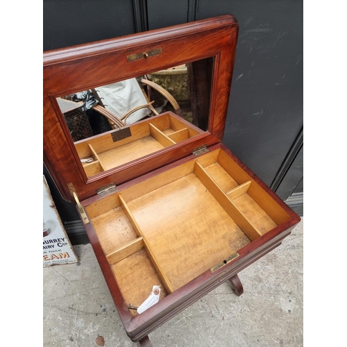 1052 - A 19th century continental mahogany work table, with hinged top, 55cm wide.