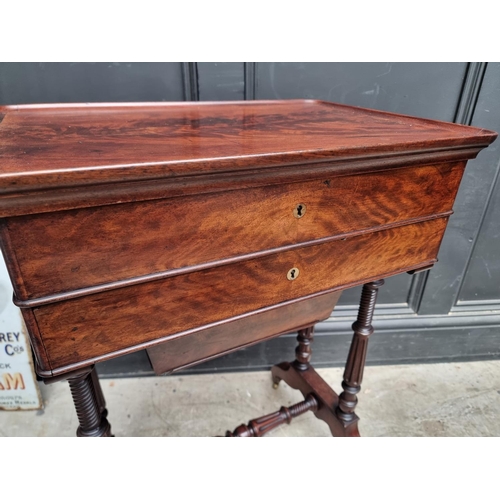 1052 - A 19th century continental mahogany work table, with hinged top, 55cm wide.