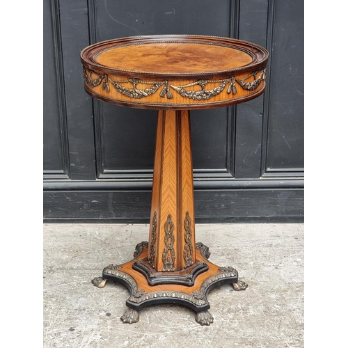 1056 - A reproduction burr walnut, tulip wood and brass mounted circular pedestal table, 51.5cm diamet... 