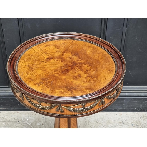 1056 - A reproduction burr walnut, tulip wood and brass mounted circular pedestal table, 51.5cm diamet... 