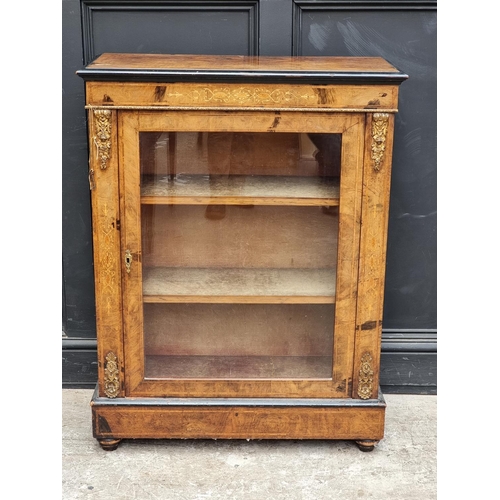 1062 - A late Victorian walnut and inlaid pier cabinet, 81.5cm wide.