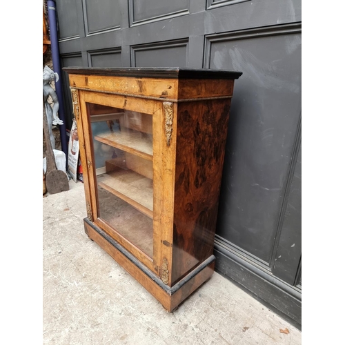 1062 - A late Victorian walnut and inlaid pier cabinet, 81.5cm wide.