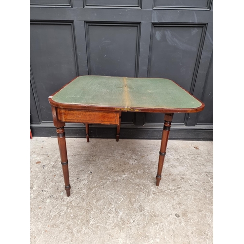 1066 - A George IV mahogany, line inlaid and crossbanded card table, with double gateleg, 91cm wide.... 