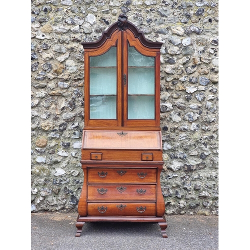 1073 - A small 18th century Dutch satinwood bombe bureau bookcase, 194cm high x 80cm at widest point.... 