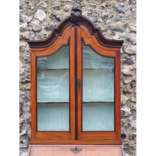 1073 - A small 18th century Dutch satinwood bombe bureau bookcase, 194cm high x 80cm at widest point.... 