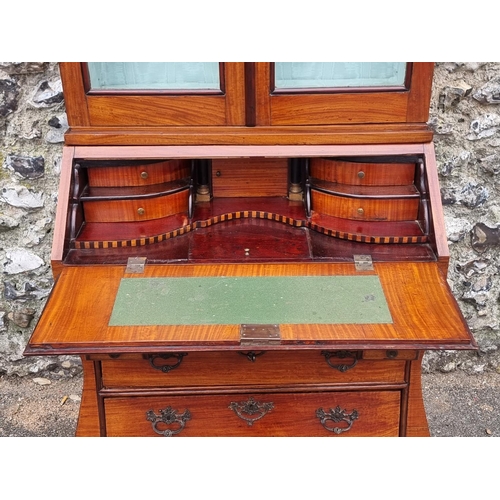 1073 - A small 18th century Dutch satinwood bombe bureau bookcase, 194cm high x 80cm at widest point.... 