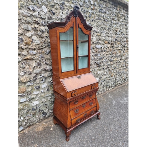 1073 - A small 18th century Dutch satinwood bombe bureau bookcase, 194cm high x 80cm at widest point.... 