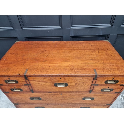 1074 - An early 20th century teak and brass bound campaign chest, with inset ivory label inscribed 'Army &a... 