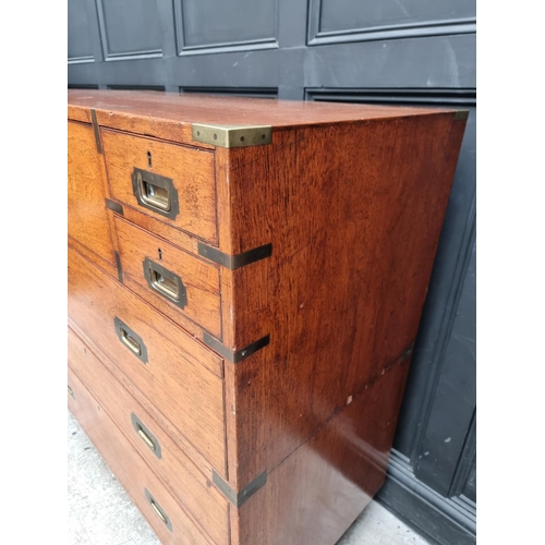 1074 - An early 20th century teak and brass bound campaign chest, with inset ivory label inscribed 'Army &a... 