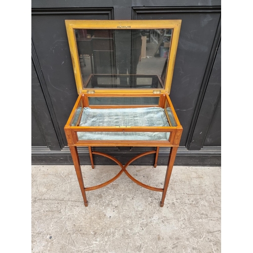 1076 - A late Victorian satinwood and inlaid bijouterie table, 61cm wide.