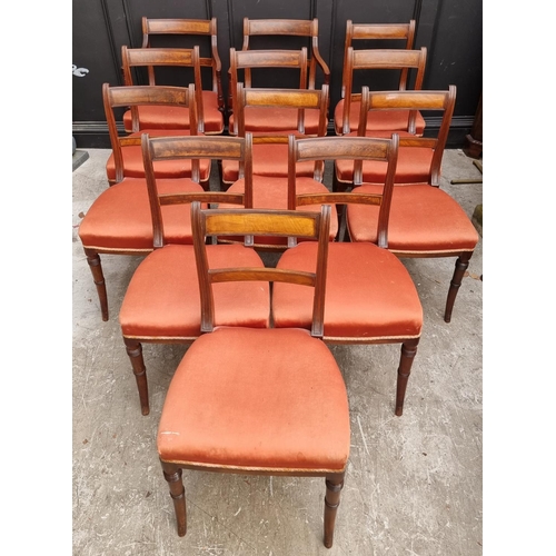 1078 - A set of twelve George III Regency mahogany bar back dining chairs, to include a pair of elbow chair... 