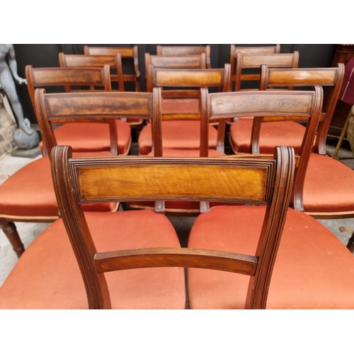 1078 - A set of twelve George III Regency mahogany bar back dining chairs, to include a pair of elbow chair... 