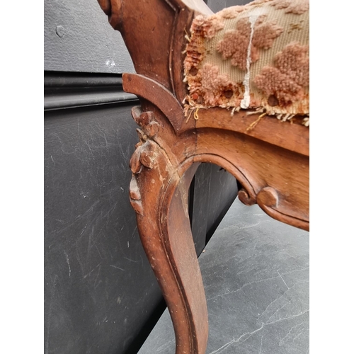 1086 - A circa 1900, Louis XV style, carved walnut window seat, 81cm wide.