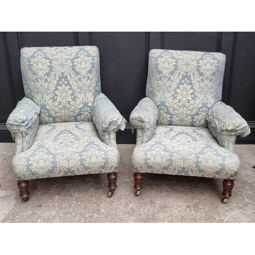 1087 - A pair of late Victorian walnut frame low occasional chairs.