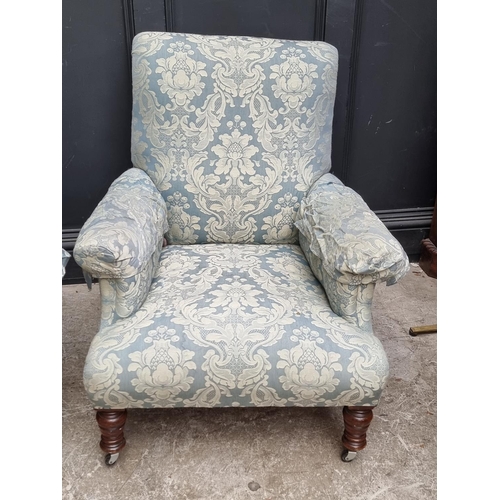 1087 - A pair of late Victorian walnut frame low occasional chairs.