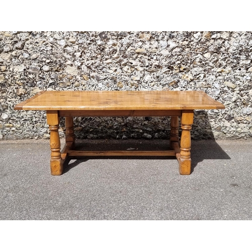 1095 - A good reproduction oak refectory table, with cleated end five-plank top, the top 213 x 106.5cm.... 