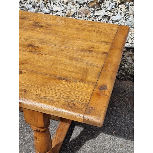 1095 - A good reproduction oak refectory table, with cleated end five-plank top, the top 213 x 106.5cm.... 