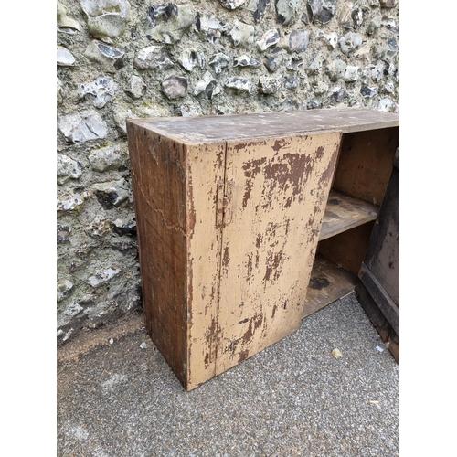 1103 - An 18th century primitive painted wall cupboard, 76cm high x 100cm wide.