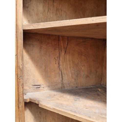 1105 - An unusual 18th century solid walnut hanging corner cupboard, 108cm high x 64cm wide.... 