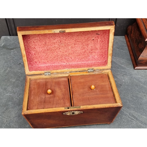 1125 - A rosewood sarcophagus tea caddy and cover, 39.5cm wide; together with another 19th century mah... 