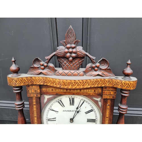 1151 - A late 19th century walnut and parquetry wall clock, the painted dial inscribed 'Skarratt & Co, ... 