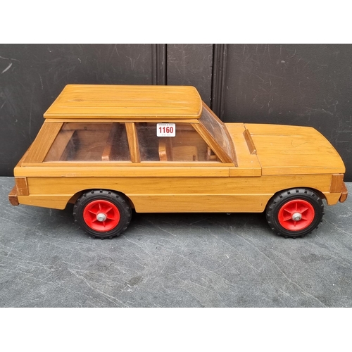 1160 - Automobilia: a pine model of a Range Rover Series 1, 59cm long.