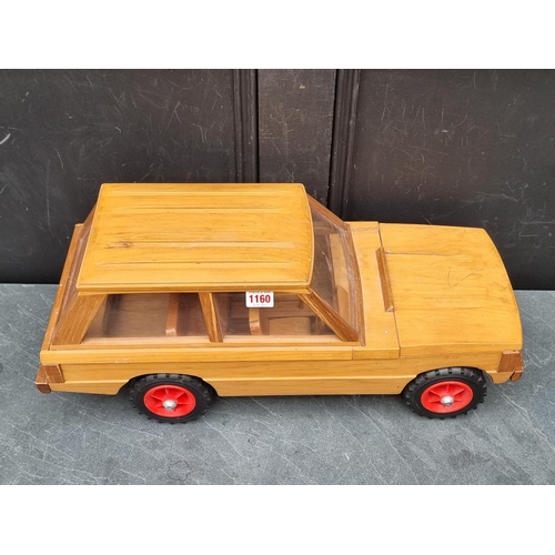 1160 - Automobilia: a pine model of a Range Rover Series 1, 59cm long.