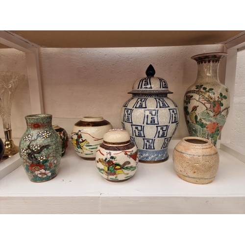 1168 - A collection of Chinese crackle glaze jars and vases, largest 30.5cm high. (7)