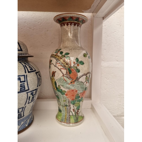 1168 - A collection of Chinese crackle glaze jars and vases, largest 30.5cm high. (7)