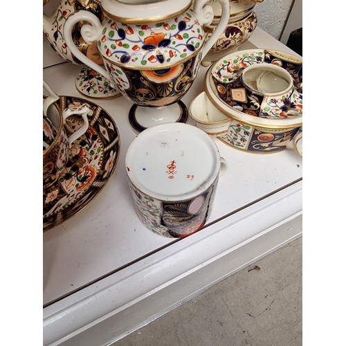 1171 - A collection of 19th century and later Derby Imari teawares and similar, (some damage and repai... 