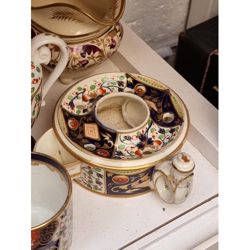 1171 - A collection of 19th century and later Derby Imari teawares and similar, (some damage and repai... 