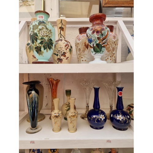 1172 - A collection of Victorian and later glass vases, to include opaline examples, largest 30cm high... 