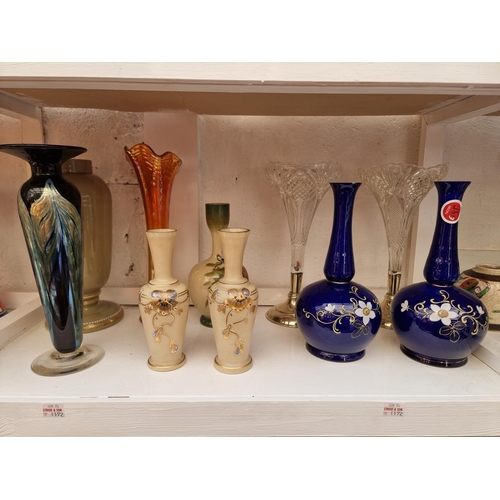 1172 - A collection of Victorian and later glass vases, to include opaline examples, largest 30cm high... 