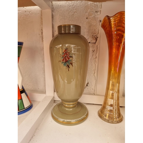 1172 - A collection of Victorian and later glass vases, to include opaline examples, largest 30cm high... 