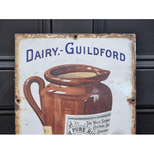 1194 - A vintage enamel 'The West Surrey Central Dairy Co's (Guildford)' sign, 60 x 28cm.