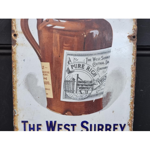 1194 - A vintage enamel 'The West Surrey Central Dairy Co's (Guildford)' sign, 60 x 28cm.