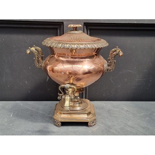 1198 - A George IV copper and brass samovar, inscribed 'Best London Manufact', 40cm high.