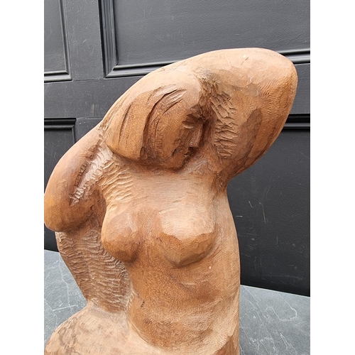 1200 - A carved hardwood female kneeling nude, 46cm high.