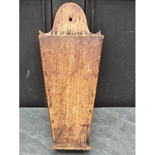 1206 - An 18th century elm candle box, 41cm high.