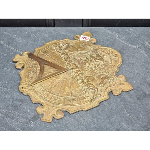 1222 - A cast brass sundial, 29cm wide.