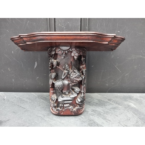 1225 - WITHDRAWN FROM SALE An oak wall bracket, carved in chinoiserie style, 39.5cm wide.