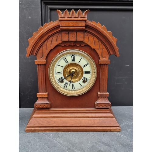 1231 - Two early 20th century oak mantel clocks, largest 36cm high, (largest lacking pendulum).... 