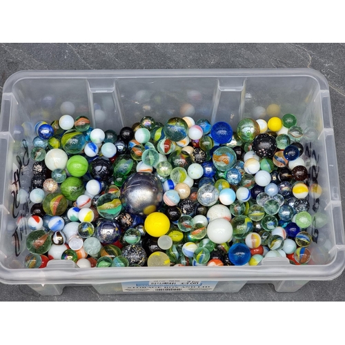 1232 - A collection of old glass marbles.