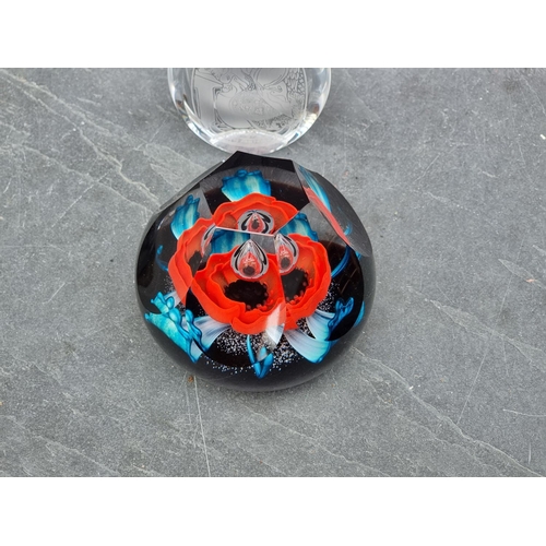 1233 - A Caithness limited edition 'WWI Remembrance Poppy' glass paperweight, boxed; together with other va... 