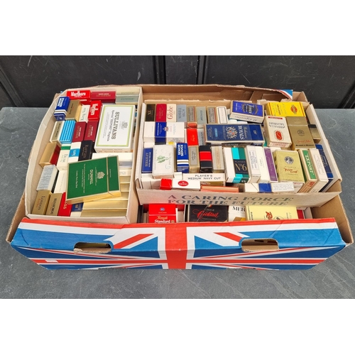 1239 - A large quantity of cigarette packets and related, (no contents).