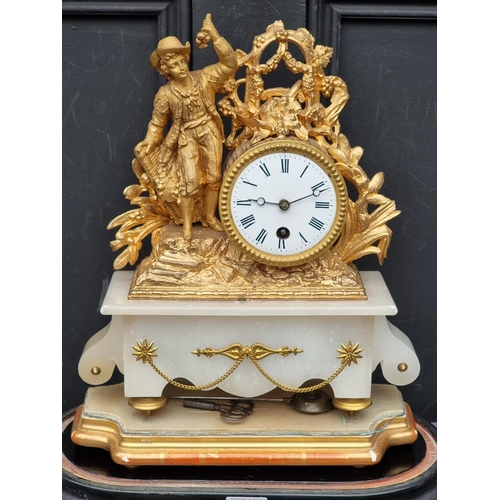 1243 - A 19th century gilt metal and alabaster mantel clock, 31cm high, with pendulum, on giltwood stand, w... 